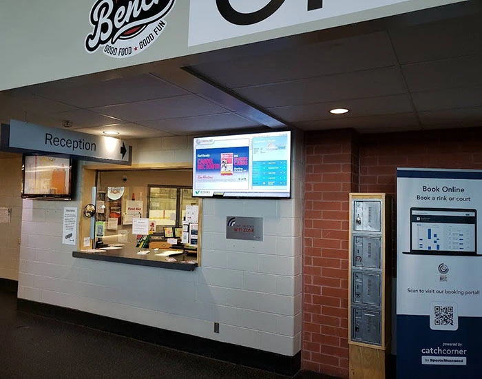 Arena advertising inside a Calgary community sports facility